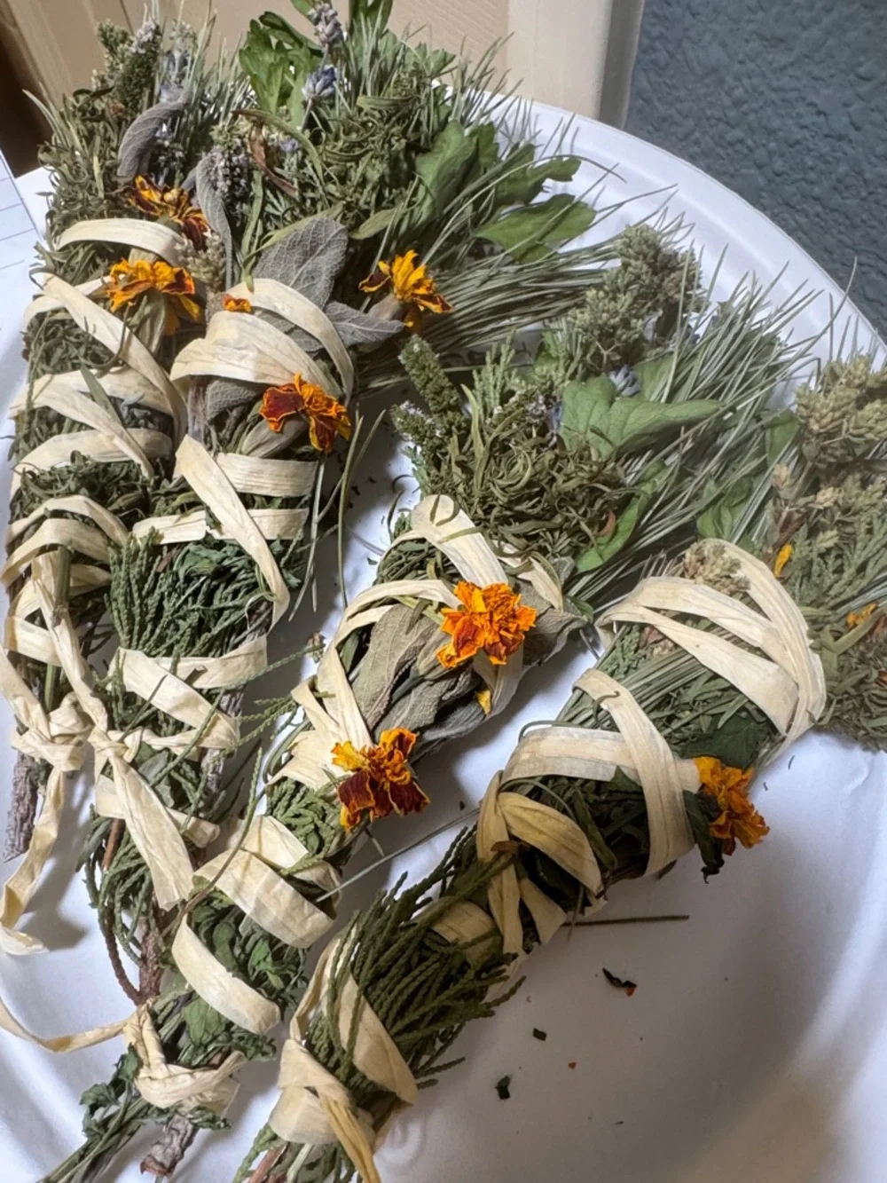 Hand-Tied organic Sage and Herb Smudge Bundle with Marigolds. Smoke medicine!
